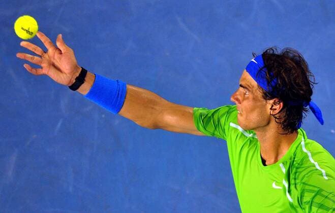 Rafael Nadal of Spain serves during the men s singles final at 2012 Australian Open tennis tournament in Melbourne, Australia, on Jan. 29, 2012. (Xinhua Chen Xiaowei) (hy) AUSTRALIA-MELBOURNE-TENNIS-MEN S-FINAL 