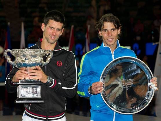 winner Novak Djokovic (L) of Serbia and Rafael Nadal of Spain pose during the awarding cerermony for the men s singles final at 2012 Australian Open tennis tournament in Melbourne, Australia, on Jan. 29, 2012. (Xinhua Bai Xue) (hy) AUSTRALIA-MELBOURNE-TENNIS-MEN S-FINAL 