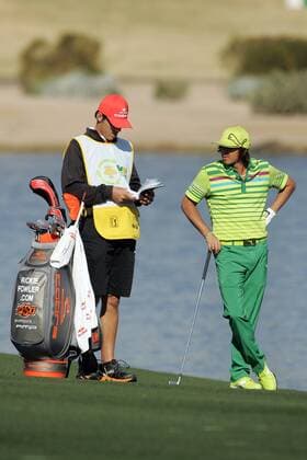 Feb. 2, 2012 - Scottsdale, Arizona, U.S - Rickie Fowler talks with his caddie during the first round of the Waste Management Phoenix Open in Scottsdale, Arizona. PGA Golf Herren 2012 - Feb 2 - Waste Managment Phoenix Open - ZUMAx12