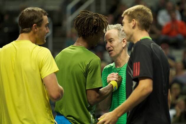 Feb. 13, 2012 - San Jose, California, U.S - John McEnroe (USA) and Gael Monfils (FRA) shake hands after a doubles exhibition at the SAP Open at HP Pavilion in San Jose, CA. ATP Tennis Herren TENNIS 2012 - Feb 13 - SAP Open - ZUMAq48
