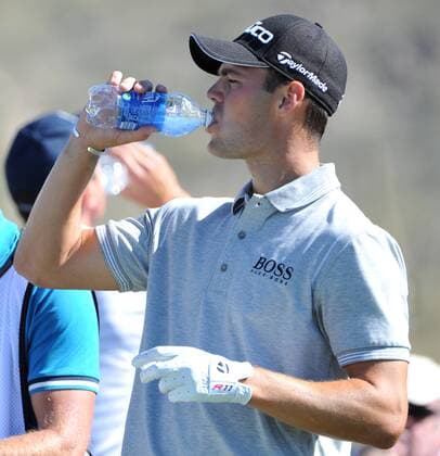 Martin Kaymer of Germany takes a drink of water before teeing off on the second tee at the World Golf Championship Accenture Match Play Championship at the Ritz-Carlton Golf Club, Dove Mountain in Marana, Arizona, February 24, 2012. UPI Art Foxall  PXP2012022402