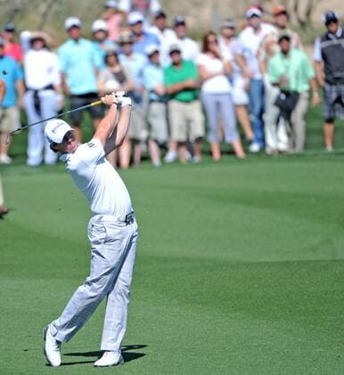 Rory McIlroy of Northern Ireland takes his second shot on the eighth hole at the World Golf Championship Accenture Match Play Championship at the Ritz-Carlton Golf Club, Dove Mountain in Marana, Arizona, February 24, 2012. UPI Art Foxall  PXP2012022420
