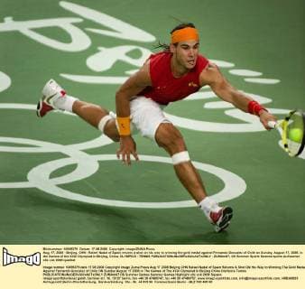Aug. 17, 2008 - Beijing, CHN - Rafael Nadal of Spain returns a shot on his way to winning the gold medal against Fernando Gonzalez of Chile on Sunday, August 17, 2008, in the Games of the XXIX Olympiad in Beijing, China. OLYMPICS - TENNIS - ZUMAm67