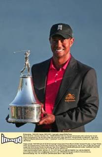 March 25, 2012 - Orlando, Florida, U.S. - TIGER WOODS holds the championship trophy after winning the Arnold Palmer Invitational for the 7th time at Bay Hill Club and Lodge. Golf 2012 - Arnold Palmer Invitational - Tiger Wins - ZUMAm67