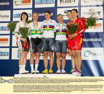(120404) -- MELBOURNE, April 4, 2012 (Xinhua) -- Silver medalists Anna Meares Kaarle Mcculloch of Australia, Gold medalists Miriam Welte Kristina Vogel of Germany and Bronze medalists Guo Shuang Gong Jinjie of China (L-R) present the medals after the women s team sprint final race on day 1 of 2012 UCI Track Cycling World Championships in Melbourne, Australia on April 4, 2012. Germany claimed the title with 32.549 seconds. (Xinhua Bai Xue) AUSTRALIA-MELBOURNE-UCI TRACK CYCLING WORLD CHAMPIONSHIPS 
