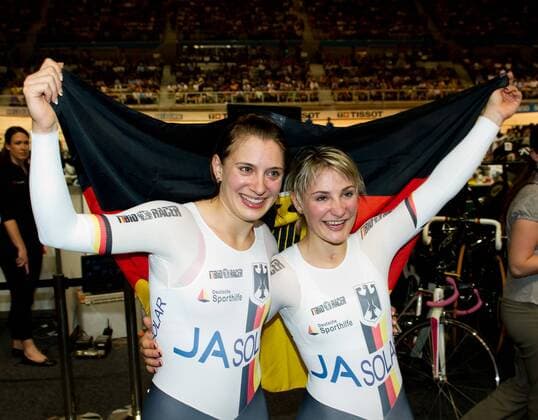 (120404) -- MELBOURNE, April 4, 2012 (Xinhua) -- Miriam Welte (R) and Kristina Vogel of Germany celebrate after winning the women s team sprint final race on day 1 of 2012 UCI Track Cycling World Championships in Melbourne, Australia on April 4, 2012. Germany claimed the title with 32.549 seconds. (Xinhua Bai Xue) AUSTRALIA-MELBOURNE-UCI TRACK CYCLING WORLD CHAMPIONSHIPS 