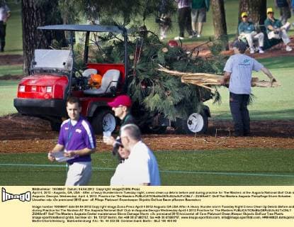 April 4, 2012 - Augusta, GA, USA - After a heavy thunderstorm Tuesday night, crews clean up debris before and during practice for The Masters at the Augusta National Golf Club in Augusta, Georgia, Wednesday, April 4, 2012. Practice for The Masters - ZUMAm67