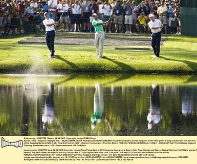 April 4, 2012 - Augusta, Georgia, U.S. - SEAN O HAIR, TIGER WOODS and MARK O MEARA skip their golfballs across the pond to the 16th green during practice for The Masters at the Augusta National Golf Club. PGA Golf Herren 2012 - Masters Tournament - Practice Round - ZUMAm67