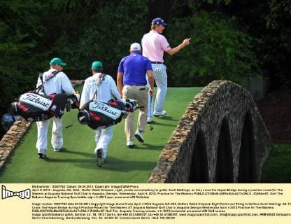 April 4, 2012 - Augusta, GA, USA - Golfer Webb Simpson, right, points out something to golfer Scott Stallings, as they cross the Hogan Bridge during a practice round for The Masters at Augusta National Golf Club in Augusta, Georgia, Wednesday, April 4, 2012. Practice for The Masters - ZUMAm67