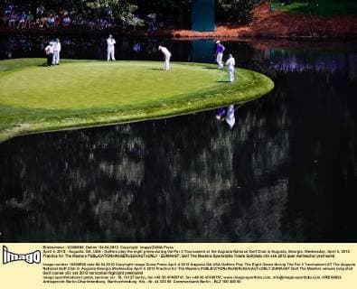 April 4, 2012 - Augusta, GA, USA - Golfers play the eight green during the Par 3 Tournament at the Augusta National Golf Club in Augusta, Georgia, Wednesday, April 4, 2012. Practice for The Masters - ZUMAm67