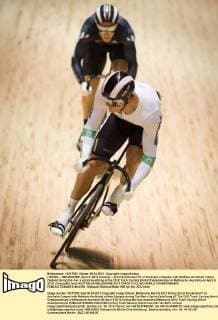 (120406) -- MELBOURNE, April 6, 2012 (Xinhua) -- Scott Sunderland (F) of Australia competes with Matthew Archibald of New Zealand during the men s sprint qualifying at the 2012 Track Cycling World Championships in Melbourne, Australia on April 6, 2012. (Xinhua Bai Xue) AUSTRALIA-MELBOURNE-2012 TRACK CYCLING WORLD CHAMPIONSHIPS 
