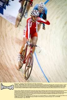 (120406) -- MELBOURNE, April 6, 2012 (Xinhua) -- Katarzyna Pawlowska of Poland celebrates after winning the women s scratch final race on day 3 of 2012 UCI Track Cycling World Championships at Hisense Arena in Melbourne, Australia on April 6, 2012. Pawlowska claimed the title with 13 minutes and 5 seconds. (Xinhua Bai Xue) (jyc) AUSTRALIA-MELBOURNE-2012 UCI TRACK CYCLING WORLD CHAMPIONSHIPS 