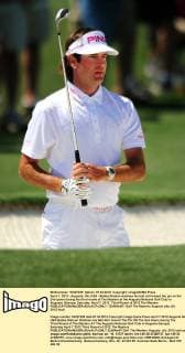 April 7, 2012 - Augusta, GA, USA - Bubba Watson watches his ball roll toward the pin on the 2nd green during the third round of The Masters at the Augusta National Golf Club in Augusta, Georgia, Saturday, April 7, 2012. Third Round of 2012 The Masters - ZUMAm67
