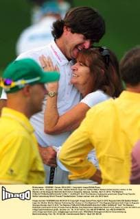April 8, 2012 - Augusta, GA, USA - Bubba Watson hugs his mother Mollie Watson following his victory in the Masters at the Augusta National Golf Club in Augusta, Georgia, Sunday, April 8, 2012. The Masters - ZUMAm67