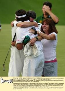 April 8, 2012 - Augusta, GA, USA - Bubba Watson is congratulated after winning the Masters by caddie Ted Scott and mother Mollie Watson at the Augusta National Golf Club in Augusta, Georgia, Sunday, April 8, 2012. The Masters - ZUMAm67