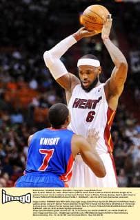 April 8, 2012 - Miami, FL, USA - Miami Heat s LeBron James looks at Detroit Pistons Brandon Knight as he ponders his next move on offense at American Airlines Arena in Miami, Florida, Sunday, April 8, 2012. Heat vs. Pistons - ZUMAm67