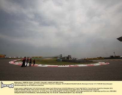 12.04.2012 Marussia F1 team staff on the track Chinese Grand Prix, Shanghai 2012 