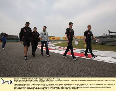 12.04.2012 Sebastian Vettel (GER) Red Bull Racing RB8 is examinating the track Chinese Grand Prix, Shanghai 2012 