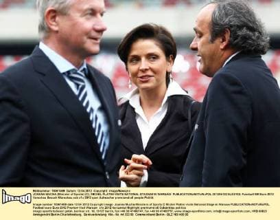 JOANNA MUCHA (Minister of Sports) (C), MICHEL PLATINI VISITS NATIONAL STADIUM IN WARSAW  20120412CSLG0102