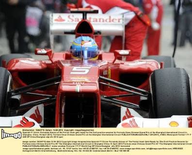 Spanish F1 driver Fernando Alonso of the Ferrari team gets ready for the first practice session for Formula Ones Chinese Grand Prix at the Shanghai International Circuit in Shanghai, China, 13 April 2012. Formula Ones Chinese Grand Prix at the Shanghai International Circuit  20120413_41863