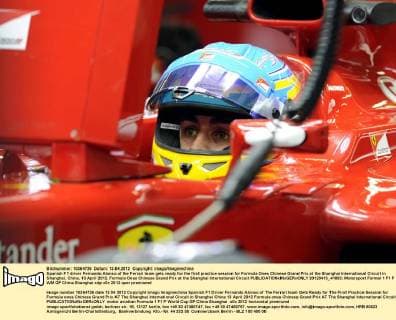 Spanish F1 driver Fernando Alonso of the Ferrari team gets ready for the first practice session for Formula Ones Chinese Grand Prix at the Shanghai International Circuit in Shanghai, China, 13 April 2012. Formula Ones Chinese Grand Prix at the Shanghai International Circuit  20120413_41893