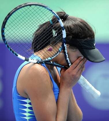 (120413) -- WENSHAN, April 13, 2012 (Xinhua) -- Aleksandrina Naydenova of Bulgaria reacts after the quarterfinal match at the Sanqi Cup 2012 ITF Women s Circuit in Wenshan, southwest China s Yunan Province, April 13, 2012. (Xinhua Yang Zongyou) CHINA-WENSHAN-TENNIS-SANQI CUP 