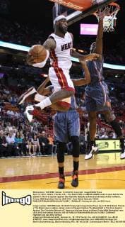 April 13, 2012 - Miami, Florida, U.S. - The Miami Heat s LeBRON JAMES looks to pass behind the basket in the first quarter against the Charlotte Bobcats at American Airlines Arena in Miami, Friday. NBA Basketball Herren USA 2012 - Heat Defeat Bobcats 105-82 - ZUMAm67