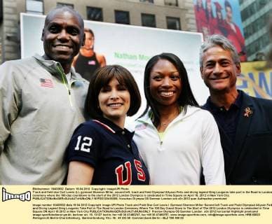 Track and field star Carl Lewis (L), gymnast Shannon Miller, second left, track and field Olympiad Allyson Felix and diving legend Greg Louganis take part in the Road to London ceremony where the 100-day countdown to the start of the 2012 London Olympics is celebrated in Time Square on April 18, 2012 in New York City.  NYP20120418305
