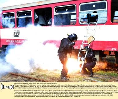 Riot-police practice of Pardubice and Liberec regions, Czech Republic, and Wroclaw, Poland, practiced in depot of trains how to intervene against violence in trains. Ceska Trebova, Czech Republic on April 18, 2012. (CTKxPhoto AlexandraxMlejnkova)  CTKPhoto008201204180713801