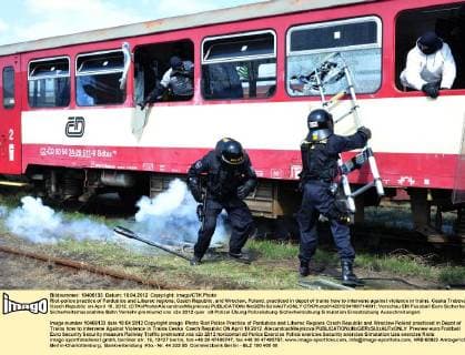 Riot-police practice of Pardubice and Liberec regions, Czech Republic, and Wroclaw, Poland, practiced in depot of trains how to intervene against violence in trains. Ceska Trebova, Czech Republic on April 18, 2012. (CTKxPhoto AlexandraxMlejnkova)  CTKPhoto014201204180714001