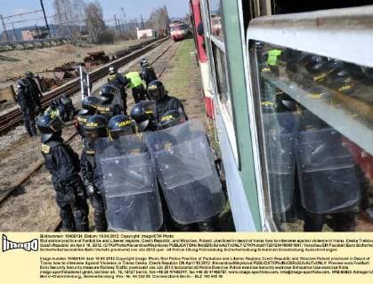 Riot-police practice of Pardubice and Liberec regions, Czech Republic, and Wroclaw, Poland, practiced in depot of trains how to intervene against violence in trains. Ceska Trebova, Czech Republic on April 18, 2012. (CTKxPhoto AlexandraxMlejnkova)  CTKPhoto017201204180691801