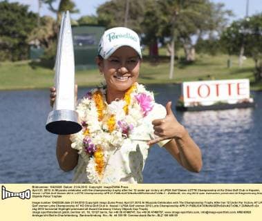 April 21, 2012: Ai Miyazato celebrates with the championship trophy after her 12 under par victory at LPGA Golf Damen LOTTE Championship at Ko Olina Golf Club in Kapolei, Hawai i LPGA Golf Damen 2012: LOTTE Championship APR 21 - ZUMAct5