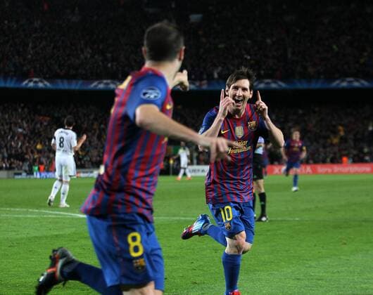 Barcelonas Lionel Messi celebrates with goalscorer Andres Iniesta..Barcelona v Chelsea, Champions League Semi Final 2nd Leg, Nou Camp, Barcelona. 24th April 2012. EDITORIAL USE ONLY. No use with unauthorised audio, video, data, fixture lists, club league logos or live services. Online in-match use limited to 120 images, no video emulation. No use in betting, games or single club league player publications.