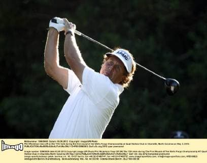 Phil Mickelson tees off on the 11th hole during the first round of the Wells Fargo Championship at Quail Hollow Club in Charlotte, North Carolina on May 3, 2012.  CHP2012050303