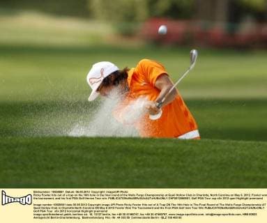 Ricky Fowler hits out of a trap on the 16th hole in the final round of the Wells Fargo Championship at Quail Hollow Club in Charlotte, North Carolina on May 6, 2012. Fowler won the tournament, and his first PGA Golf Herren Tour win.  CHP2012050651
