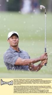 May 10, 2012 - Vedra Beach, Florida, U.S. - Golfer TIGER WOODS hits the ball out of the bunker on the10th hole during round 1 of THE PLAYERS Championship held at THE PLAYERS Stadium golf course at TPC Sawgrass in Ponte Vedra Beach, Florida. Golf 2012 - THE PLAYERS Championship Round 1  - ZUMAr11