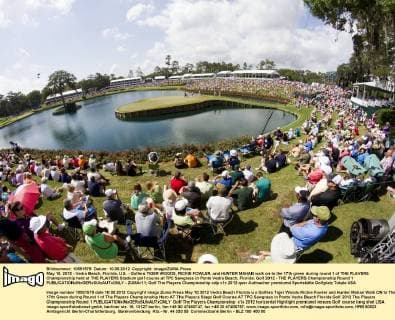 May 10, 2012 - Vedra Beach, Florida, U.S. - Golfers TIGER WOODS, RICKIE FOWLER, and HUNTER MAHAN walk on to the 17th green during round 1 of THE PLAYERS Championship held at THE PLAYERS Stadium golf course at TPC Sawgrass in Ponte Vedra Beach, Florida. Golf 2012 - THE PLAYERS Championship Round 1  - ZUMAr11