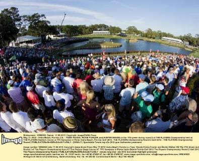May 11, 2012 - Vedra Beach, Florida, U.S. - TIGER WOODS, RICKIE FOWLER, and HUNTER MAHAN on the 17th green during round 2 of THE PLAYERS Championship held at THE PLAYERS Stadium course at TPC Sawgrass in Ponte Vedra Beach, Florida. Golf 2012 - THE PLAYERS Championship Round 2 Golf 2012 - THE PLAYERS Championship Round 2  - ZUMAr11