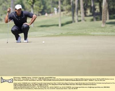 May 11, 2012 - Vedra Beach, Florida, U.S. - TIGER WOODS eyes up a putt on the 7th green during round 2 of THE PLAYERS Championship held at THE PLAYERS Stadium course at TPC Sawgrass in Ponte Vedra Beach. Golf 2012 - THE PLAYERS Championship Round 2  - ZUMAr11