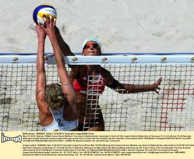 May 12, 2012; Beijing, CHINA; Sanne Keizer Marleen Van Iersel of Netherlands rebounded to hold off 21st seeds Holtwick Semmler of Germany 21-14, 24-26 and 16-14 Saturday afternoon to take home the bronze medal and wrap up the trip to China with two straight top four finishes. China Sports 2012: FIVB Beach Volleyball SWATCH World Tour MAY 12  - ZUMAc10