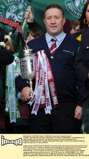 Football - Scottish FA Cup Final - Hibernian FC vs. Hearts of Midlothian - John Robertson Ex Hearts striker with the Scottish Cup moments before the game at Hampden Park. 