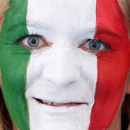 FUSSBALL - UEFA EURO 2012, Fotoshooting GRAZ,AUSTRIA,22.MAI.12 - FUSSBALL, Vorschau, Fotoshooting. Archivbild zeigt ein Model mit der italienischen Fahne als Gesichtsbemalung. Keywords: Bodypainting, Flagge, Italien, Fan. - MODEL RELEASED - 