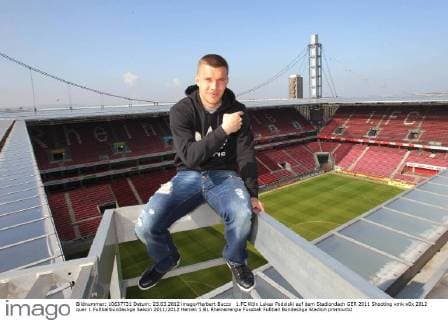 1.FC Köln Lukas Podolski auf dem Stadiondach