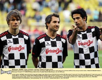 22.05.2012- Charles Pic (FRA) Marussia F1 Team with Timo Glock (GER) Marussia F1 Team and Lucas di Grassi (BRA) at the charity football match. 