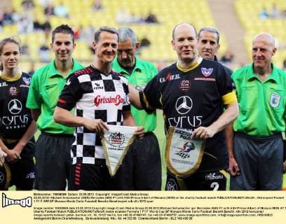 22.05.2012- Michael Schumacher (GER) Mercedes AMG F1 with HSH Prince Albert of Monaco (MON) at the charity football match 