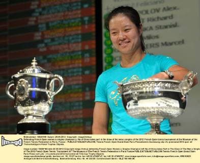Defending French Open women s singles champion Li Na of China takes part in the draw of the men s singles of the 2012 French Open tennis tournament at the Museum of the French Tennis Federation in Paris, France - 