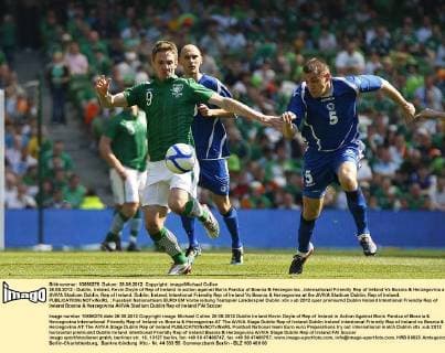 26.05.2012 - Dublin, Ireland, Kevin Doyle of Rep of Ireland in action against Boris Pandza of Bosnia & Herzegovina, ,international Friendly Rep of Ireland Vs Bosnia & Herzegovina at the AVIVA Stadium Dublin, Rep of Ireland. Dublin, Ireland, Intentional Friendly Rep of Ireland Vs Bosnia & Herzegovina at the AVIVA Stadium Dublin, Rep of Ireland. 