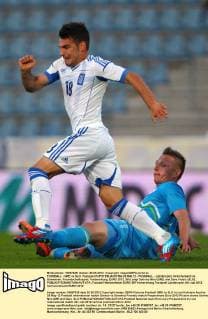 FUSSBALL - GRE vs SLO, Testspiel KUFSTEIN,AUSTRIA,26.MAI.12 - FUSSBALL - Länderspiel, Griechenland vs Slowenien, Freundschaftsspiel, Vorbereitung, EURO 2012. Bild zeigt Sotirios Nini (GRE) und Dare Vrdsic (SLO). 