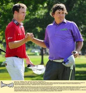 May 26, 2012 - Fort Worth, TX, USA - Jason Dufner, right, shakes hands with Zach Johnson at the end of the third round of the Crowne Plaza Invitational at Colonial at Colonial Country Club in Fort Worth, Texas, Saturday, May 26, 2012. Dufner enters the final round with a one-shot lead over Johnson. Colonial Round Three - ZUMAm67
