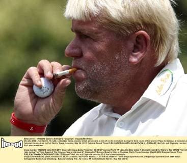 May 26, 2012 - Fort Worth, TX, USA - John Daly takes a smoke break as he waits to tee off on the ninth hole during the third round of the Crowne Plaza Invitational at Colonial at Colonial Country Club in Fort Worth, Texas, Saturday, May 26, 2012. Colonial Round Three - ZUMAm67